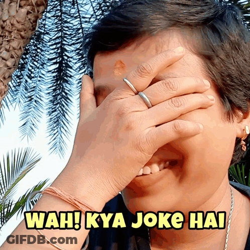 A Woman Covering Her Face With Her Hand With Wah Kya Joke Hai Written In Yellow GIF