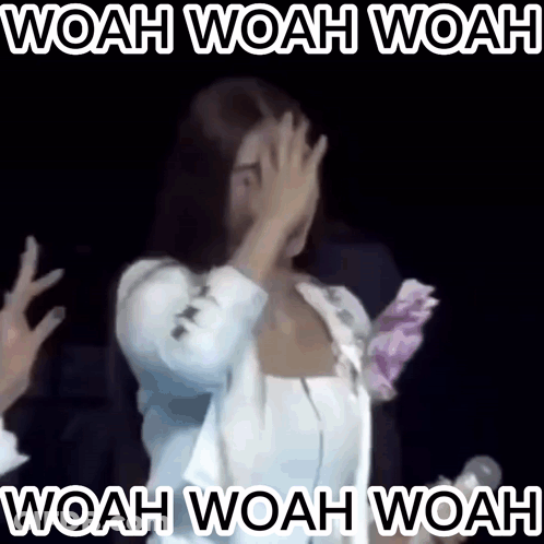 A Woman Covering Her Face With Her Hands With The Words Woah Woah Woah In White Letters GIF