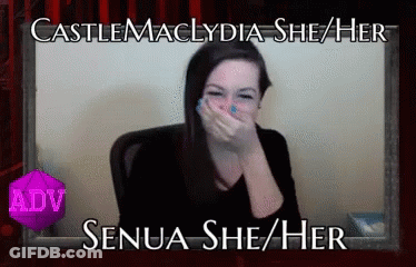 A Woman Covering Her Mouth With Her Hand With The Name Senua She / Her On The Bottom GIF