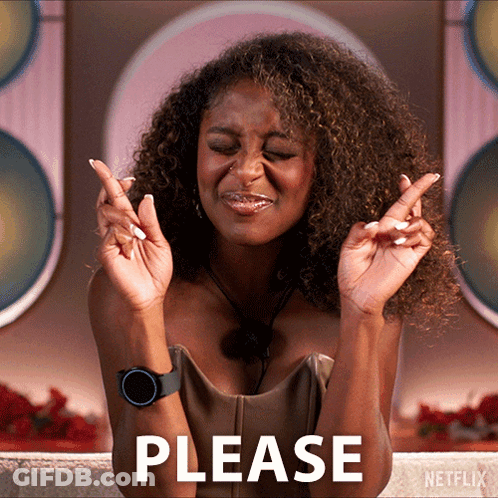 A Woman Crosses Her Fingers In Front Of A Netflix Logo GIF