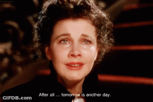 A Woman Crying With The Words After All Tomorrow Is Another Day Below Her GIF