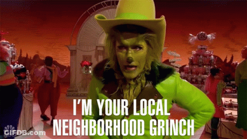 A Woman Dressed As The Grinch Says " I 'M Your Local Neighborhood Grinch " In Front Of A Crowd GIF