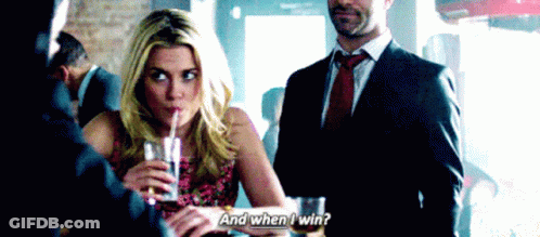 A Woman Drinking Through A Straw With The Words " And When I Win " Written On The Bottom GIF