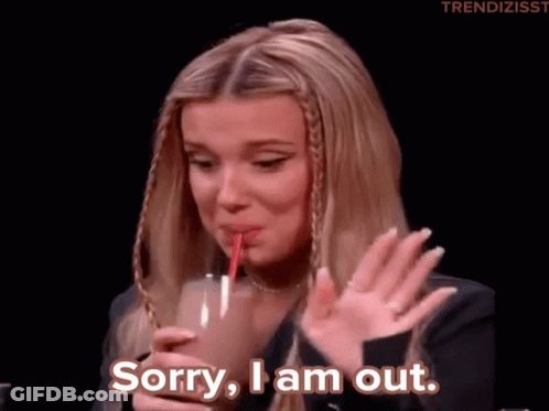 A Woman Drinking Through A Straw With The Words Sorry I Am Out Below Her GIF