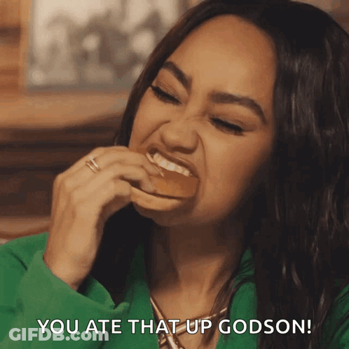 A Woman Eating A Hamburger With The Words You Ate That Up Godson GIF