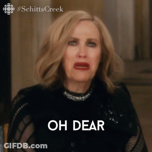 A Woman From Schitt 'S Creek Is Making A Funny Face And Says Oh Dear . GIF