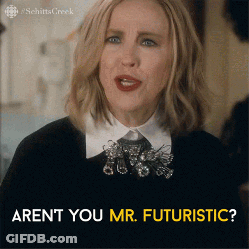 A Woman From Schitts Creek Says " Aren 'T You Mr. Futuristic ? " GIF