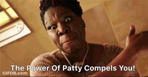 A Woman Giving A Thumbs Up With The Words " The Power Of Patty Compels You " GIF
