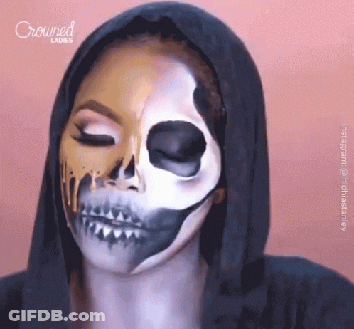 A Woman Has Her Face Painted To Look Like A Skeleton And Crowned Ladies Is Behind Her GIF