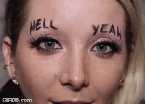 A Woman Has The Words Hell And Yeah Written On Her Face . GIF