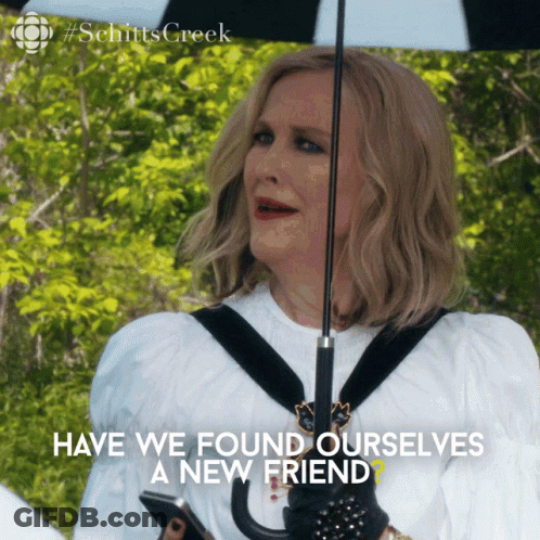 A Woman Holding A Black And White Umbrella With The Words Have We Found Ourselves A New Friend GIF