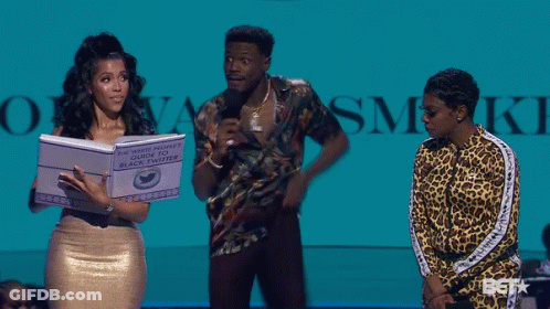 A Woman Holding A Book Titled The White People 'S Guide To Black Twitter GIF