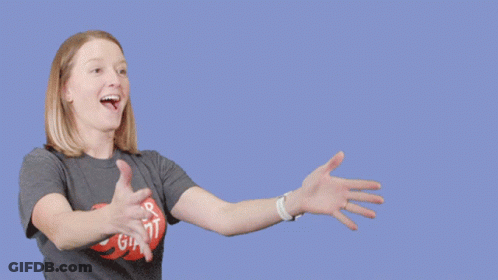 A Woman Holding A Cardboard Box That Says Fragile GIF