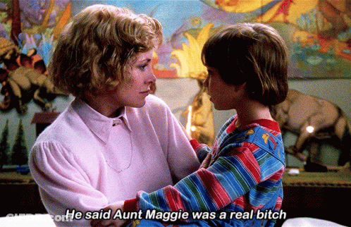 A Woman Holding A Child With The Words He Said Aunt Maggie Was A Real Bitch GIF