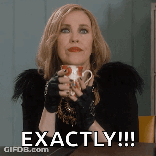 A Woman Holding A Cup Of Coffee With The Words Exactly Written Below Her GIF