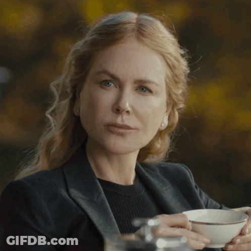 A Woman Holding A Cup Of Coffee With The Words I Didn 'T Written Below Her GIF