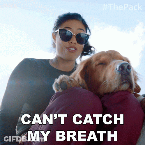 A Woman Holding A Dog With The Words Can 'T Catch My Breath GIF