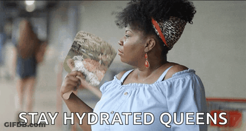 A Woman Holding A Fan With The Words Stay Hydrated Queens Written Below Her GIF
