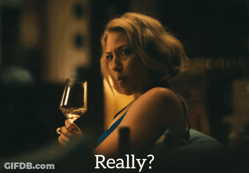 A Woman Holding A Glass Of Wine With The Word Really Behind Her GIF
