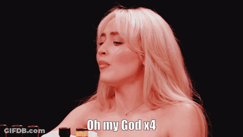A Woman Holding A Glass With The Words Oh My God X4 GIF