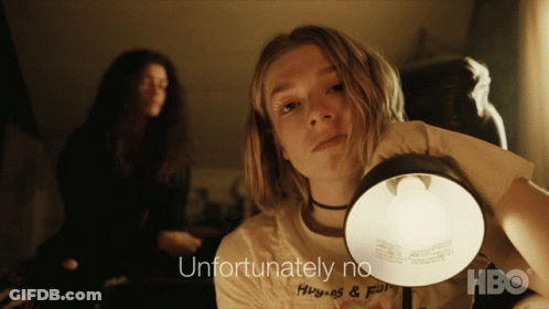 A Woman Holding A Lamp With The Words Unfortunately No On The Bottom Right GIF