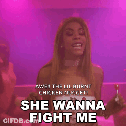 A Woman Holding A Lollipop With The Words She Wanna Fight Me Below Her GIF