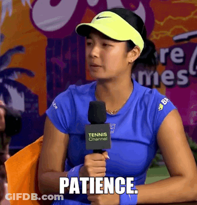 A Woman Holding A Microphone That Says Patience GIF