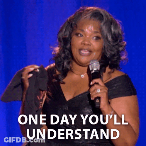 A Woman Holding A Microphone With The Words One Day You 'Ll Understand Below Her GIF