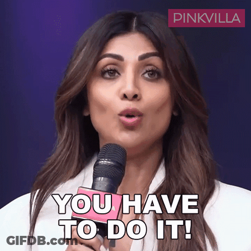 A Woman Holding A Microphone With The Words You Have To Do It GIF