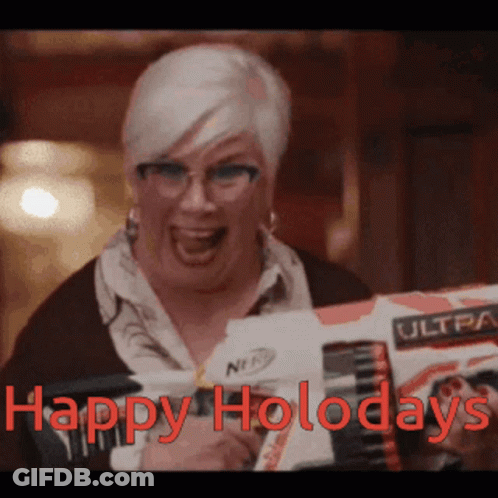 A Woman Holding A Nerf Gun With The Words Happy Holodays Written On It GIF