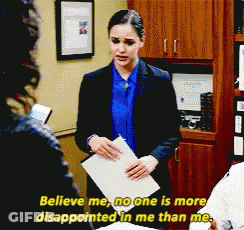 A Woman Holding A Piece Of Paper With The Words " Believe Me No One Is More Disappointed In Me Than Me " GIF