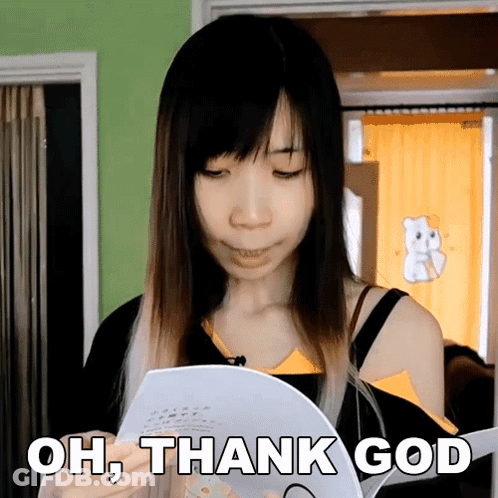 A Woman Holding A Piece Of Paper With The Words Oh Thank God Written On It GIF