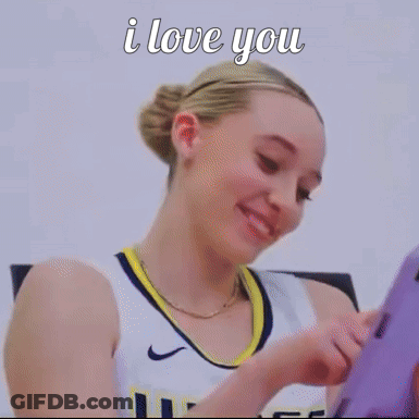 A Woman Holding A Purple Tablet With The Words I Love You Written Above Her GIF