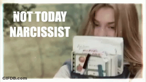 A Woman Holding A Stack Of Papers With The Words " Not Today Narcissist " Written Above Her GIF