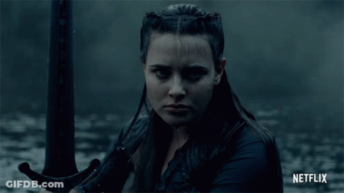 A Woman Holding A Sword With Netflix Written On The Bottom Right GIF