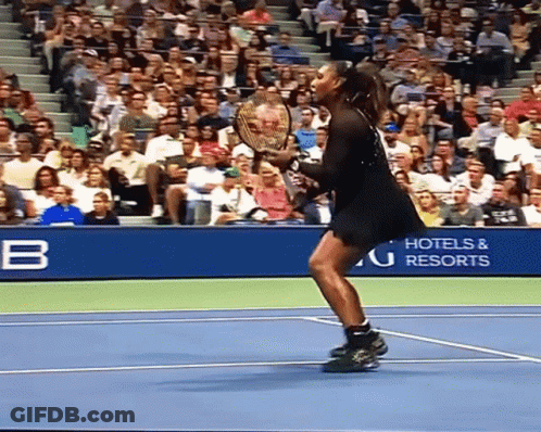 A Woman Holding A Tennis Racquet On A Tennis Court In Front Of A Hotel And Resorts Sign GIF