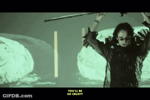A Woman Holding A Violin With The Words " You 'Ll Be So Crusty " Below Her GIF