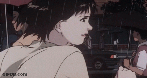 A Woman Holding An Umbrella Is Walking In The Rain GIF