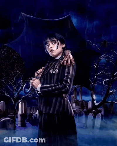 A Woman Holding An Umbrella Stands In A Cemetery GIF