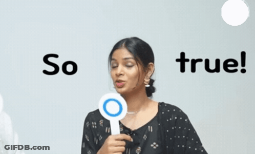 A Woman Holding Up A Sign That Says So True GIF