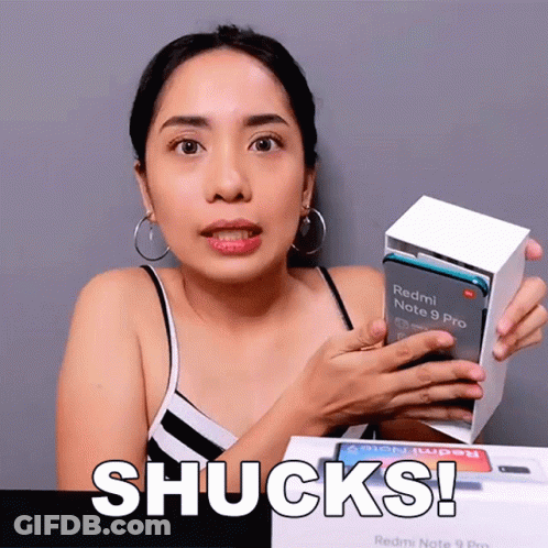 A Woman Holds A Redmi Note 9 Pro In Her Hands GIF