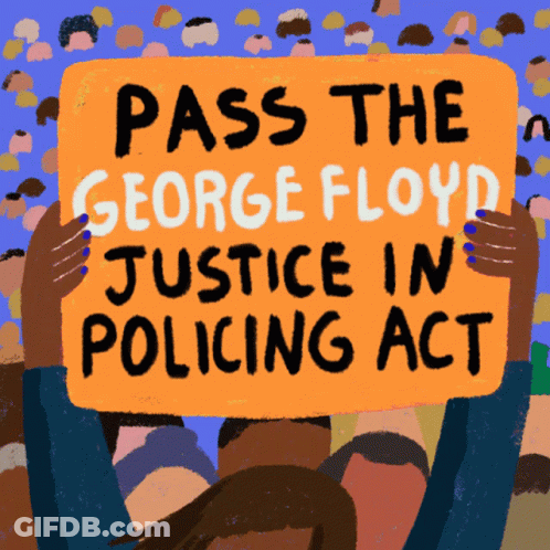 A Woman Holds Up A Sign That Says Pass The George Floyd Justice In Policing Act GIF