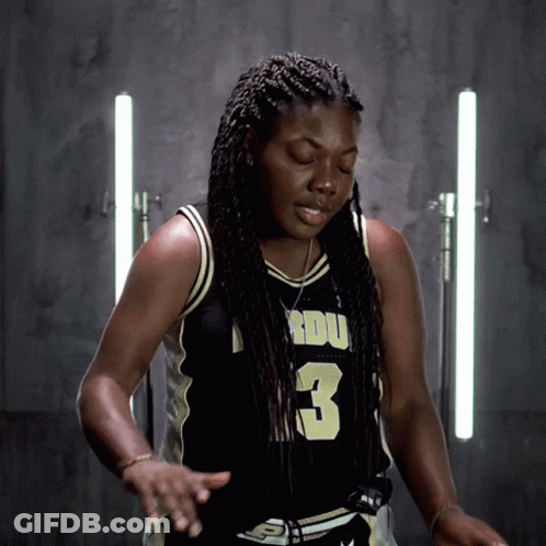A Woman In A Basketball Jersey With The Number 3 GIF