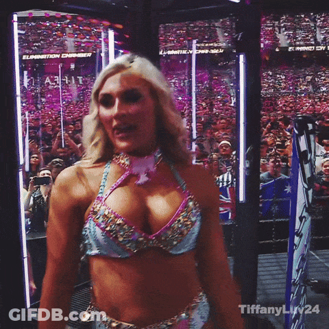 A Woman In A Bikini Is Standing In A Wrestling Ring With The Word Tiffany On The Bottom GIF