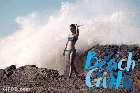A Woman In A Bikini Stands In Front Of A Wave With The Words Beach Girl Written In Blue GIF