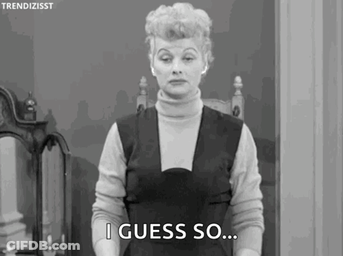 A Woman In A Black And White Photo Is Standing In Front Of A Mirror And Saying `` I Guess So ... '' . GIF
