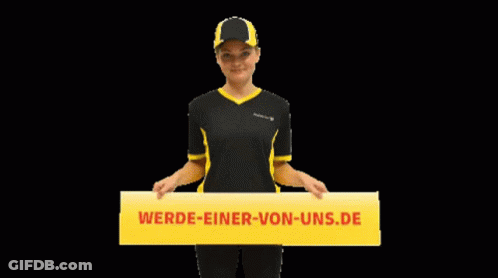 A Woman In A Black And Yellow Shirt Holds A Yellow Sign That Says Werde-Einer-Von-Uns.de GIF
