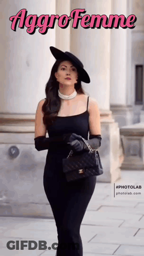 Woman In Black Dress And Hat With Chanel Purse GIF