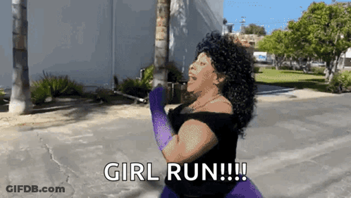 A Woman In A Black Dress And Purple Gloves Is Saying Girl Run GIF