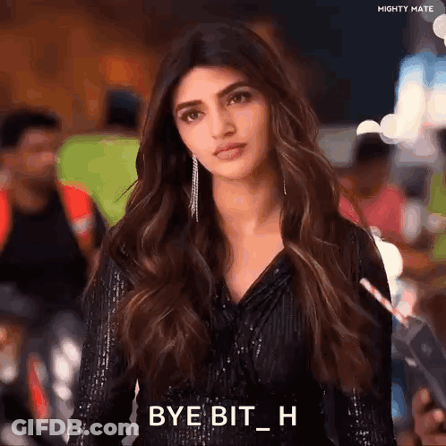 A Woman In A Black Dress Is Holding A Straw In Her Hand And Saying Bye Bit H . GIF